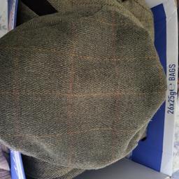 we have a country wear flat cap for sale in excellent condition from smoke and pet free home collection only