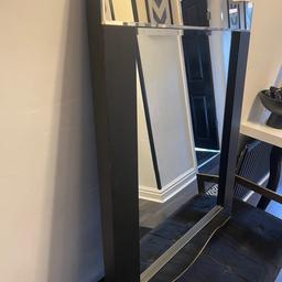 Re listed due to time waister!

Large black and gold Art Deco mirror
In good condition bought from homesense 12 months ago paid £129.99 for.
Black wooden frame with gold mirror at top and bottom see photos
Some minor marks to black wood but noticeable when up. No marks to the glass
Length 90cm width 50cm
Collection only
Smoke and pet free home