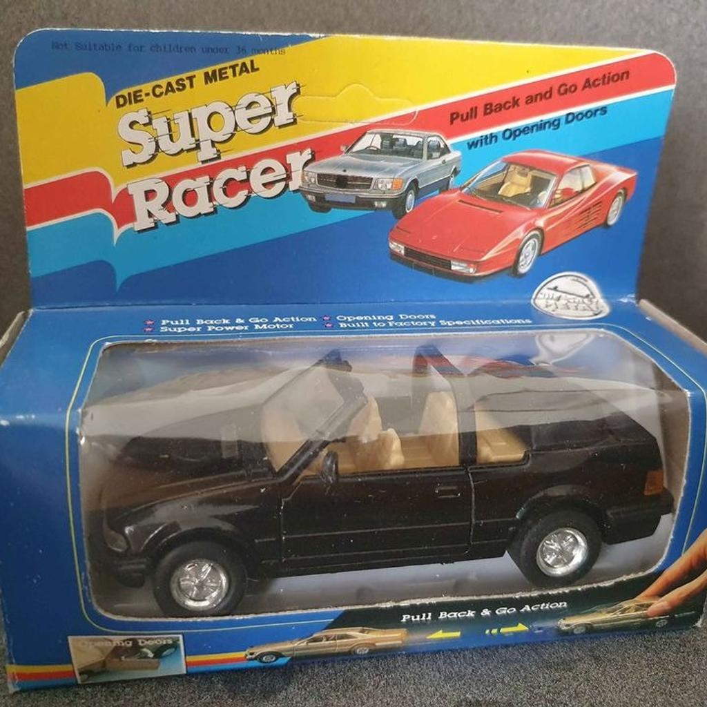 Vintage 90s Super Racer Escort Convertible Diecast

Box showing signs of storage wear
Model in excellent condition
Please look at photos carefully as they form part of description
£5.00 + P&P If needed