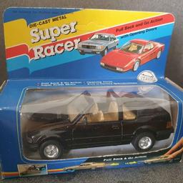 Vintage 90s Super Racer Escort Convertible Diecast

Box showing signs of storage wear
Model in excellent condition 
Please look at photos carefully as they form part of description 
£5.00 + P&P If needed