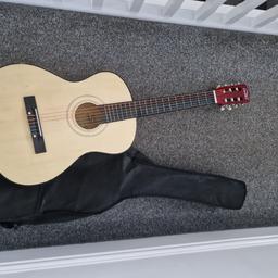 As seen. Children's guitar. Brought from smyths for my 2 to use at school (label was on back- can be cleaned off).
few scuffs as seen in pics but great condition otherwise. And black carry case.