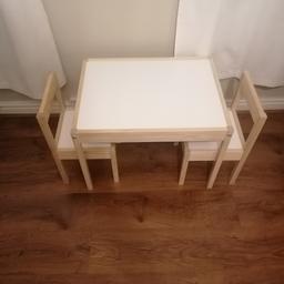 Children table and chairs for 2 in great condition. Use for eating, playing etc. Barely used no damage