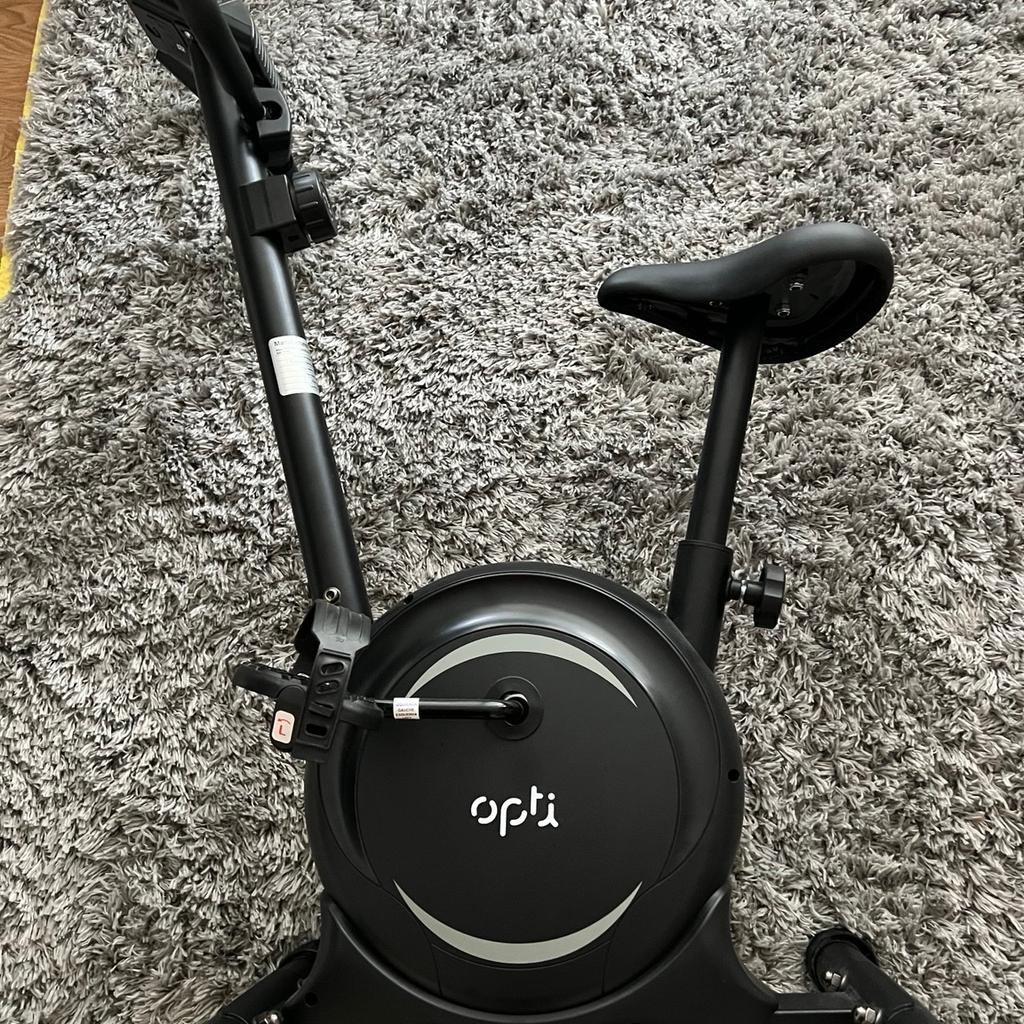 Opti Magnetic Exercise Bike
Perfect condition, hardly used

Slay your fitness goals with this magnetic exercise bike. Designed to help you get in shape from the comfort of your home or office. A smart machine, it boosts your heart rate and monitors it at the same time. It also keeps track of your progress by displaying the time, distance, speed and calories used. Comes with 8 levels of tension control so you can up the difficulty level when you're ready to challenge yourself. And the precision balanced fly wheel ensures a smooth and quiet ride.

Settle in and improve your cardio fitness. This Opti magnetic exercise bike has an adjustable seat to help you achieve a perfect fit. .
Magnetic resistance system.
Hand grip pulse sensor.
Console feedback including: Time, distance, speed, calorie. Hand pulse sensor, ODO, scan.
8 level tension control.
2kg flywheel.
Adjustable seat.
Maximum user weight 100kg (15st 10lb).