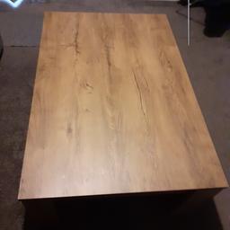 large walnut coffee table. in excellent condition