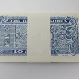 a hundred Korean 10 Jeon Banknotes 1962 
Bank of Korea block of approx 100 x 10 Jeon Banknotes 1962 in crisp condition
Each one sell on ebay at 8 pounds