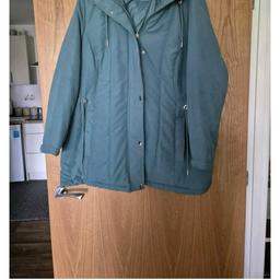 vgc coat more teal colour.  worn once lost weight so now too big