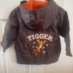 Tigger Rain Coat - Jacket - Lightweight - Tigger - Disney brand - Disney Store - 6-9 months - baby boys clothes - Winnie the Pooh - Polyester 

Delivery Price is for postage - Will lower Postage Cost for multiple items - will deliver to local area if more than one item bought (within one mile) - 50p charge if only one item bought - collect for free from Gosport