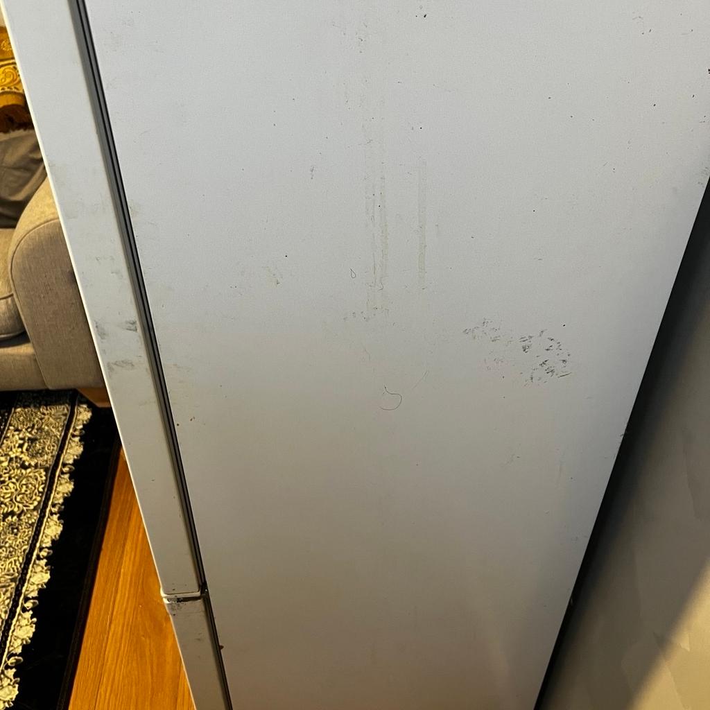 The fridge freezer is in good working condition despite being a bit dirty in the picture and having broken drawers. We're selling it because we don't have enough space for it. You could come and check. It is definitely worth its cost and remember that the price can be changed.