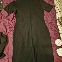 Black dress and black long jacket. The dress has short sleeves and jacket has buttons hidden in a flap. Both from Marks and Spencer and is a size 12. Good condition, hardly used. Can be collected or delivered.