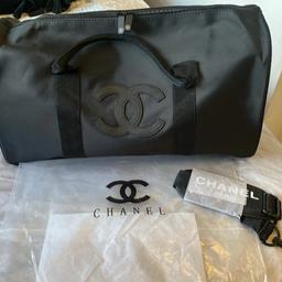 Chanel VIP counter gift complementary. Genuine and welcome gift for chanel members. Authentic 100%. 

if you are familiar with VIP chanel gifts only please buy. any questions please ask. Great bargain. 

this is gym or duffle or weekend away shoulder bag with strap. for men and women.