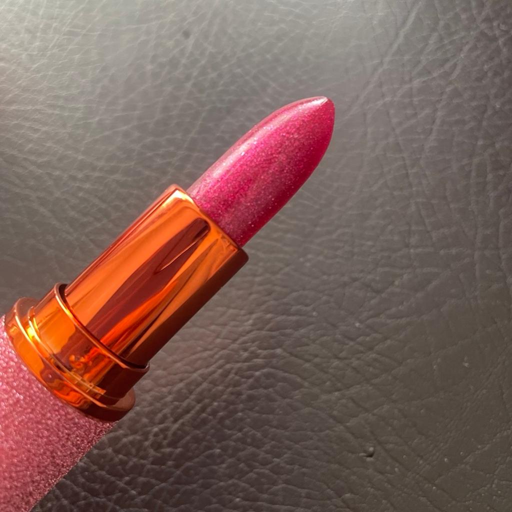 Sparkly lipstick. Opened it to see the colour but never used it, too dark for me and so can’t return it. From a smoke free home. Collection from FY1 6LJ
