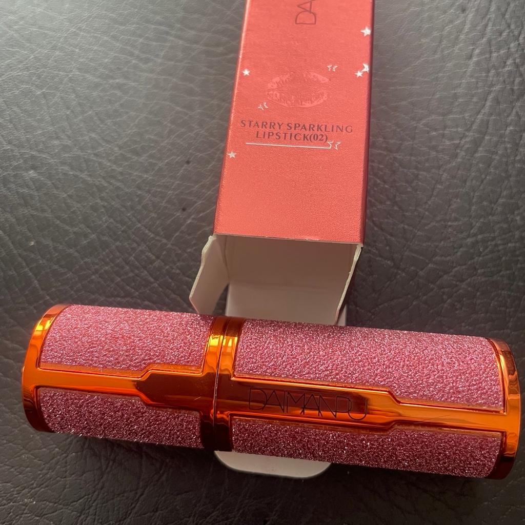 Sparkly lipstick. Opened it to see the colour but never used it, too dark for me and so can’t return it. From a smoke free home. Collection from FY1 6LJ