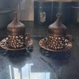 2 Turkish copper colour coffee cups and matching saucers got them from Turkey excellent condition