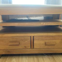 Very strong heavy and good condition table with drawers .