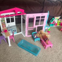 Barbie doll house with shopping accessories
