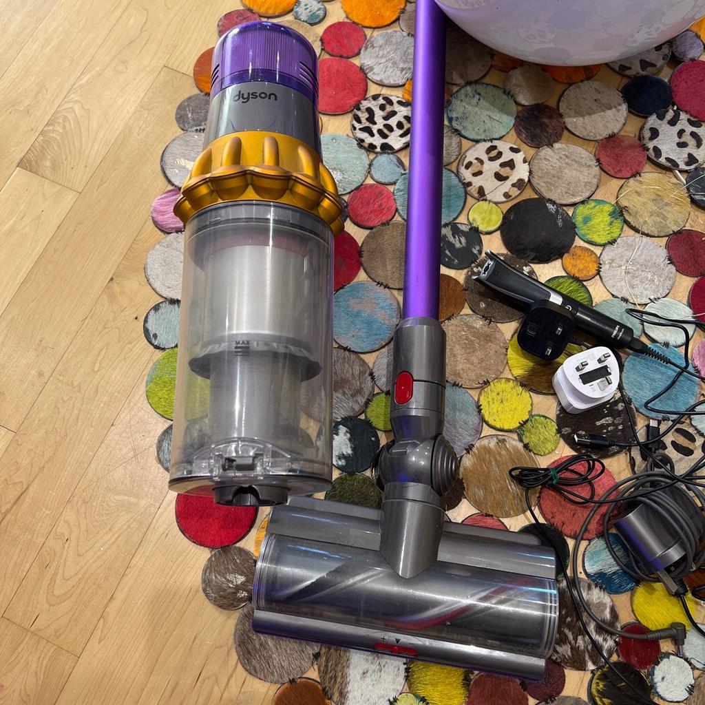 Dyson V15 used few times in excellent pristine conditions. Comes with High torque head as per pics the head alone cost 100£ and its powerful motorized. The suction is amazing and recognizes the floor type and change speed accordingly. Battery life is as new and holds very long. Used it few times as I have another Dyson Hoover. Original charger.