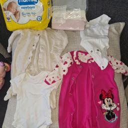 I have loads of baby clothes and nappies I won't charge for nappies I will put them in free if anyone needs them newborn nappies clothes are newborn tiny baby up to month and 3/6 months message me will upload more pics once I've sorted them all out thanks open to offers