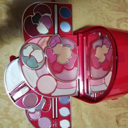Vintage Pupa Flower in Red Make Up Kit Made in Italy 

Collectors dream! 

4 floors of goodies. 
20 Lipsticks
14 Eyeshadows
3 Blush
1 Highlighter