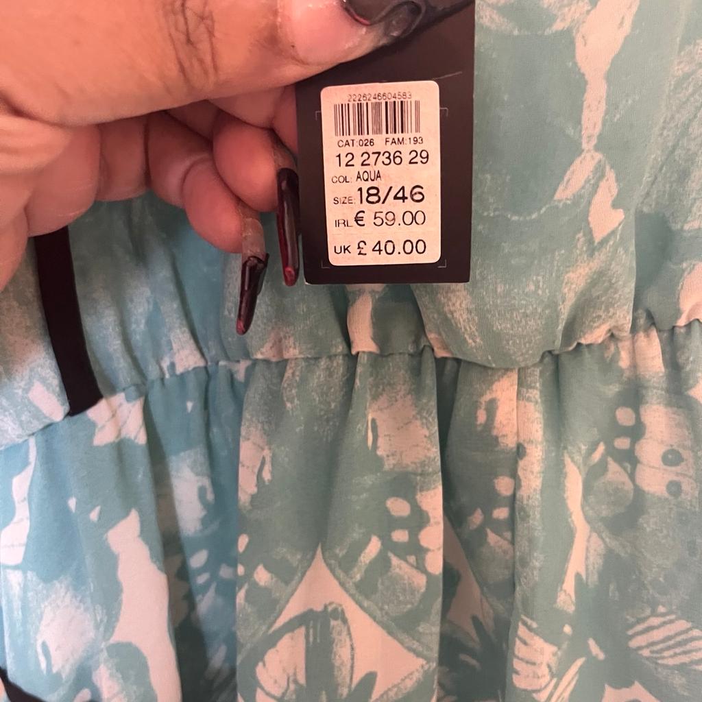 Spring or summer this waterfall hemmed multi color dress is cute. Perfect for a wedding, roof top bar, sunny days at a bbq. with double spaghetti straps, matching belt, also lined in teal blue. It’s a size 18 but probably better fit for a size 16 as it comes up small. It has never been worn and still has the label on it.
#plussizedress #summerdress #occasionwear #partydress #summerdress