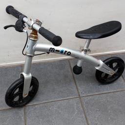 Kids Balance Bike Bicycle With Rear Brake. Adjustable steering and seat height. Some cosmetic wear but all good useable condition.