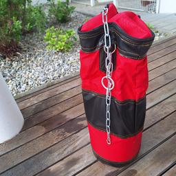 Boxsack inkl. Boxhandschuhe und Sandfüllung und mit Aufhängekette

Wie neu, nur wenige Male benutzt