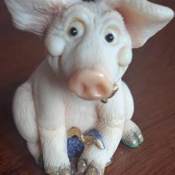 Piggin Sweetie made by David Corbridge in 1995 comes used but in very good condition. No box. Measures approximately 3 inches tall and 2.5 inches wide.