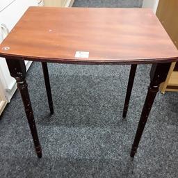 This vintage mahogany long elegant legged veneered coffee table looks like it was part of a set of a nest of tables. I only have this one table however... There are some marks on the legs.

17 inches wide x 13.5 inches deep x 20.5 inches long.

Our second hand furniture mill shop is LOW COST MOVES, at St Paul's trading estate, Copley Mill, off Huddersfield Road, Stalybridge SK15 3DN...Delivery available for an extra charge.

There are some large metal gates next to St Paul's church... Go through them, bear immediate left and we are at the bottom of the slope, up from the red steps... 

If you are interested in this or any other item, please contact me on 07734 330574, or on the shop 0161 879 9365...Many thanks, Helen.

We are normally OPEN Monday to Friday from 10 am - 5 pm and Saturday 10 am -  3.30 pm.. CLOSED Sundays. CLOSED Bank Holiday long weekends...