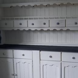 Beautiful solid pine painted dresser. Could do with a paint refresh but has new handles and cup hooks. very heavy but comes in 2 pieces. Buyer will need a van and 2 people to lift.
180cm wide
215cm high
43cm depth