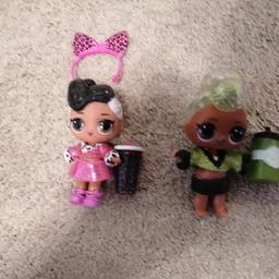 2 lol dolls dressed with accessories