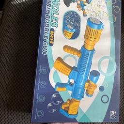 12 Holes M416 electric Bubble Gun 
Brand new in the box never opened