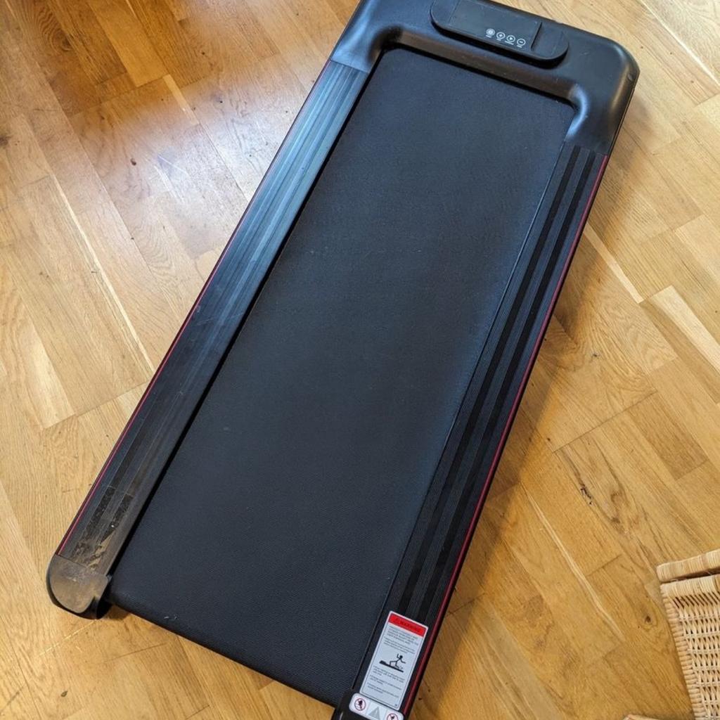 One year old, hardly used. Originally bought on Amazon for £209.99 here: 

Bigzzia Motorised Walking Treadmill, Under desk Running Machine with Remote & APP Control, LED Display, Treadmills for Home Office Aerobic Exercise Black

Brand	bigzzia
Colour	Black
125D x 53W x 12H centimetres
20 Kilograms

About this item
QUIET - Powerful & Smooth Motor - This electric treadmill for home use is suitable for users with a maximum weight of up to 110KG, the low noise motor ensures perfect performance for running, jogging, or walking in the comfort of your home environment, you don't have to worry about yourself and others being disturbed.
Multifunctional Display Screen - With speeds ranging from 1 - 8 km / h, The multifunctional LED display tracks your performance including time, calorie, speed, distance, and step, promising an effective and superior home treadmill workout.