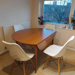 Dining round table, sides can fold
Slight damage, scratch mark on it
4 white chairs

All for 25