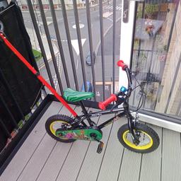 12 inch kids training bike jungle and animals design both boys and girls with assisting bar to help balance the kids whilst training bought for £90 only £40  cash in collection only please from UB 24WN.