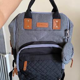 Baby Advanced Nappy Changing Bag 
Brand New 
Grey with black Color 
Comes with changing mat, bottle bag, pacifier holder n 2 convenient stroller straps 
Waterproof material
Multiple compartments for organised storage
Perfect bag for Mum N dad
Smoke pet free home 
Collection from b12 or postage xtra