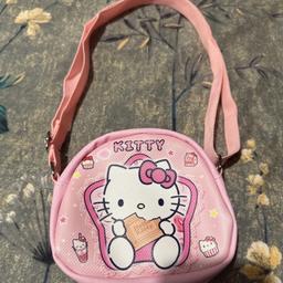 Brand new hello kitty bag for girls. Comes with an expandable strap. Can make it short or long. Lovely quality.