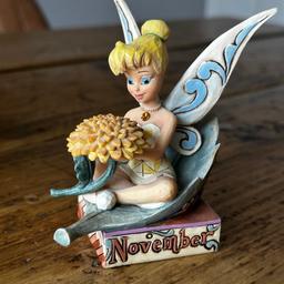 Disney Traditions Tinkerbell November Birthstone Topaz rare figurine in excellent condition. Unfortunately I don’t have the original box but will be well packaged for delivery. Please see my other Disney items for sale