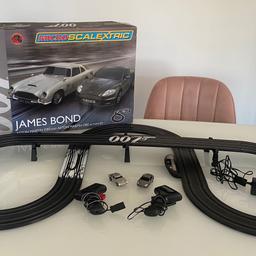 Micro Scalextric G1122 James Bond 007 Aston Martin DB5 v’s Aston Martin DBS
A 1:64 scale Micro Scalextric set in the image of James Bond 007.

The set contains silver Aston Martin DB5, an Aston Martin DB5, 3.7m of track and accessories, 2 x controllers fitted with speed limiter and a power supply.