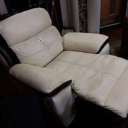 This very large cream and black well-made real leather electric reclining armchair is in good overall used condition. There are some dints in the leather in places through but no rips or tears...The back also comes off. It reclines into an almost vertical position.

44 inches wide x 3 ft deep x 40 inches high.

Our second hand furniture mill shop is LOW COST MOVES, at St Paul's trading estate, Copley Mill, off Huddersfield Road, Stalybridge SK15 3DN...Delivery available for an extra charge.

There are some large metal gates next to St Paul's church... Go through them, bear immediate left and we are at the bottom of the slope, up from the red steps... 

If you are interested in this or any other item, please contact me on 07734 330574, or on the shop 0161 879 9365...Many thanks, Helen.

We are normally OPEN Monday to Friday from 10 am - 5 pm and Saturday 10 am -  3.30 pm.. CLOSED Sundays. CLOSED Bank Holiday long weekends...