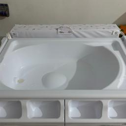 Comes with bath changing table and lots of storage. Great condition.
