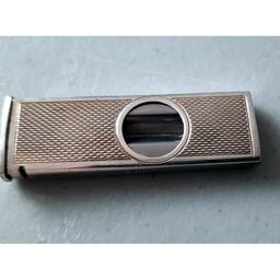 1973 W M Ltd Silver Cigar Cutter Engine Turned Geometric

In Good Condition

Hallmark indicates 1973 Birmingham, England (Possibly William Manton Ltd, Tenby Street, Birmingham)

The blade can be removed for sharpening/cleaning, stamped FOREIGN to the inside.