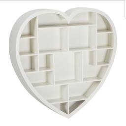 excellent condition white heart shaped floating shelf-15 shelves for display
v heavy and large weighs 9kg. Bought from Range £50 hardly used.