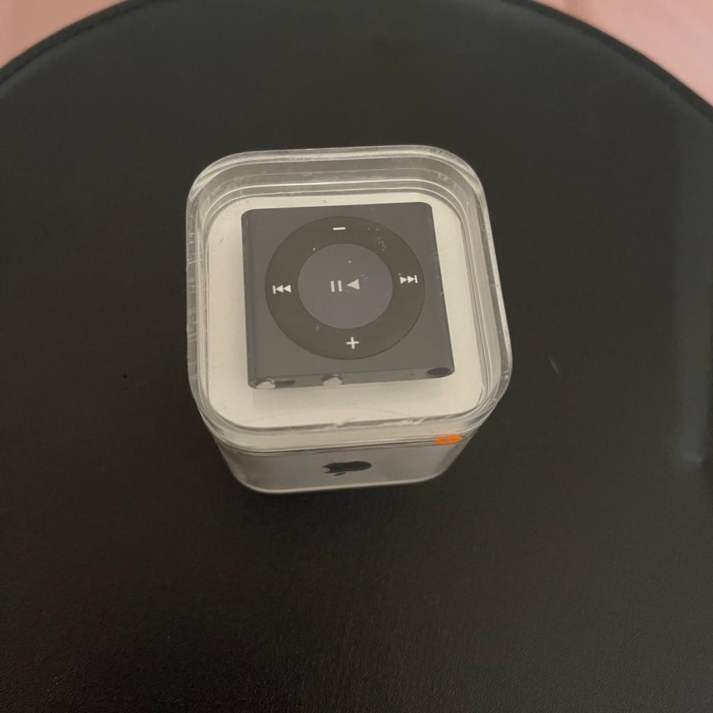Brand new. Still in original box and sealed with the original tape.

2gb iPod shuffle in black.

Comes with iPod, charging cable and headphones in the sealed unit.

Perfect for a collector or iPod lovers!