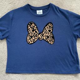 Navy blue cropped t-shirt with leopard print Minnie Mouse bow
Good used condition, some slight bobbling 
Age 5-6 years but a favourite of my daughters so she wore it as a cropped t-shirt at 6-7 and 7-8 years

* PLEASE VIEW MY OTHER ITEMS - HAPPY TO COMBINE POSTAGE *

** FROM A SMOKE FREE HOME **