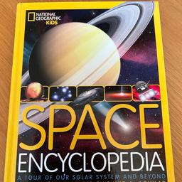 Large A4 sized hardback copy 
National Geographic kids 
SPACE ENCYCLOPEDIA 
Hardly used - in very good clean condition as can be seen in the photographs
Retail price £17:99
Listed on multiple sites
From a smoke free pet free home
A tour of our solar system and beyond. 
Jump avoid a tour of the solar system and vent to the stars, and beyond in this visually spectacular Encyclopedia of our universe   
⭐️ more than 70, specially commissioned pieces of stunning original art, including the newly discovered planet near Alpha Centauri that could conceivably support life. 
⭐️ extraordinary photographic, images of Saturns, rings, Jupiters, moons and stars in the cosmos. 
⭐️ lively essays, with clear and fascinating explanations of the latest and greatest astronomical discoveries from dark matter to the surface of Mars. 
⭐️ A tour of the 13th planet solar system. 
⭐️ sidebars , and a timeline on the amazing discovery in the history of astronomy. 
⭐️ a timeline of the edge of the universe