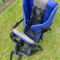 Children Back pack carrier can be used as a chair as well pockets either side for bottle. Fully padded in Good condition