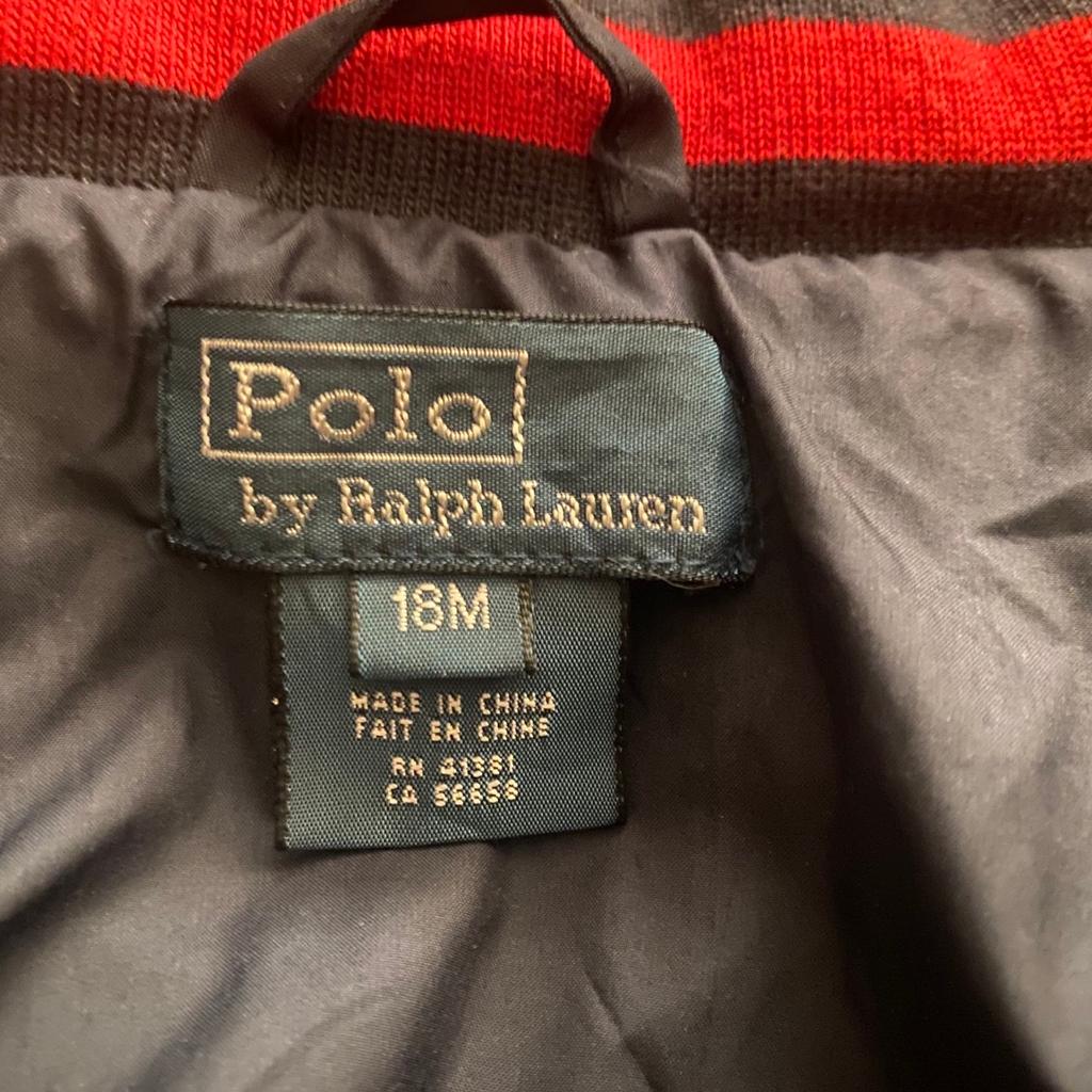 Polo Ralph Lauren jacket aged 18 months.

Second hand but in very good condition, only flaw is no clip on inside of one pocket as shown in the picture, this does not effect the function in anyway.

Has a hood that can be zipped into the collar.

Is machine washable and a shell material.

Collection available from W10 or TW7, offers considered and bulk order discounts available alongside other items. All items dispached via tracked delivery, please send full postcode for accurate, costing.