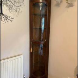 Beautiful mahogany display cabinet with glass shelves. The unit features a light inside but it’s currently not working - would assume the bulbs can be changed or light can just be unscrewed altogether. 

Measures approx. 201cm (H) x 50cm (W) 30cm (D). 

No time wasters please - lots of interest but everyone fails to turn up for collection