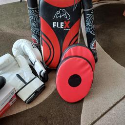 boxing boots size 6. gloves large. punch pads and sticks. All in new condition. boots only tried on once. perfect gift for young boxing fanatic. COLLECTION ONLY WEOLEY CASTLE