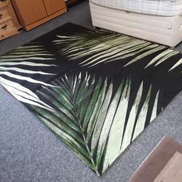 This lovely, very thin lightweight large green and black rug with leaf pattern is in very good, clean, used condition.

91 inches long x 63 inches wide.

Our second hand furniture mill shop is LOW COST MOVES, at St Paul's trading estate, Copley Mill, off Huddersfield Road, Stalybridge SK15 3DN... Delivery available for an extra charge.

There are some large metal gates next to St Paul's church... Go through them, bear immediate left and we are at the bottom of the slope, up from the red steps... 

If you are interested in this or any other item, please contact me on 07734 330574, or on the shop 0161 879 9365...Many thanks, Helen. 

We are OPEN Monday to Friday from 10 am - 5 pm and Saturday 10 am - 3.30 pm... CLOSED Sundays.  CLOSED Bank Holiday long weekends...