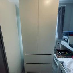IKEA NORDLI 
Wardrobe with two large drawers

Very solid price of furniture in fantastic as new condition. Only selling as I’ve just bought and built a larger wardrobe for my son. 

Very small defect inside when the back was screwed on (as per pic) but it’s not noticeable as inside and makes zero difference. Rest of wardrobe is pristine with no marks. 

Two hooks for side which have never been screwed on so you can move them where you like. 

£80

Wardrobe will fit in most cars fully built if the back seats are lowered. Check using these measurements:

Height: 182cm
Width: 73cm
Depth: 56cm.

I can help you lift it in. Can deliver locally - within 10 miles of Altrincham (WA15) if it helps.

Thanks 
Jonathan